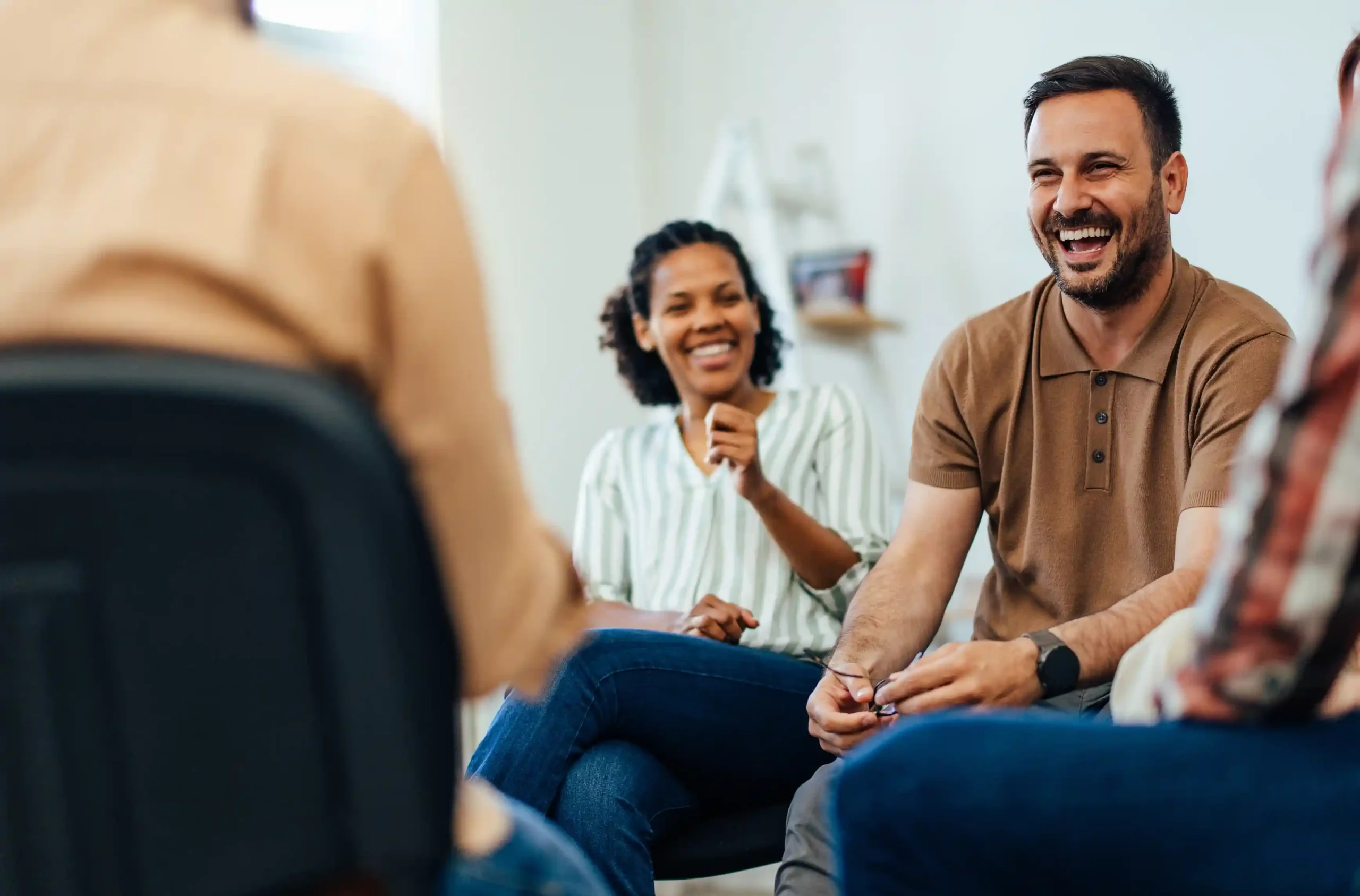 man smiling at meeting